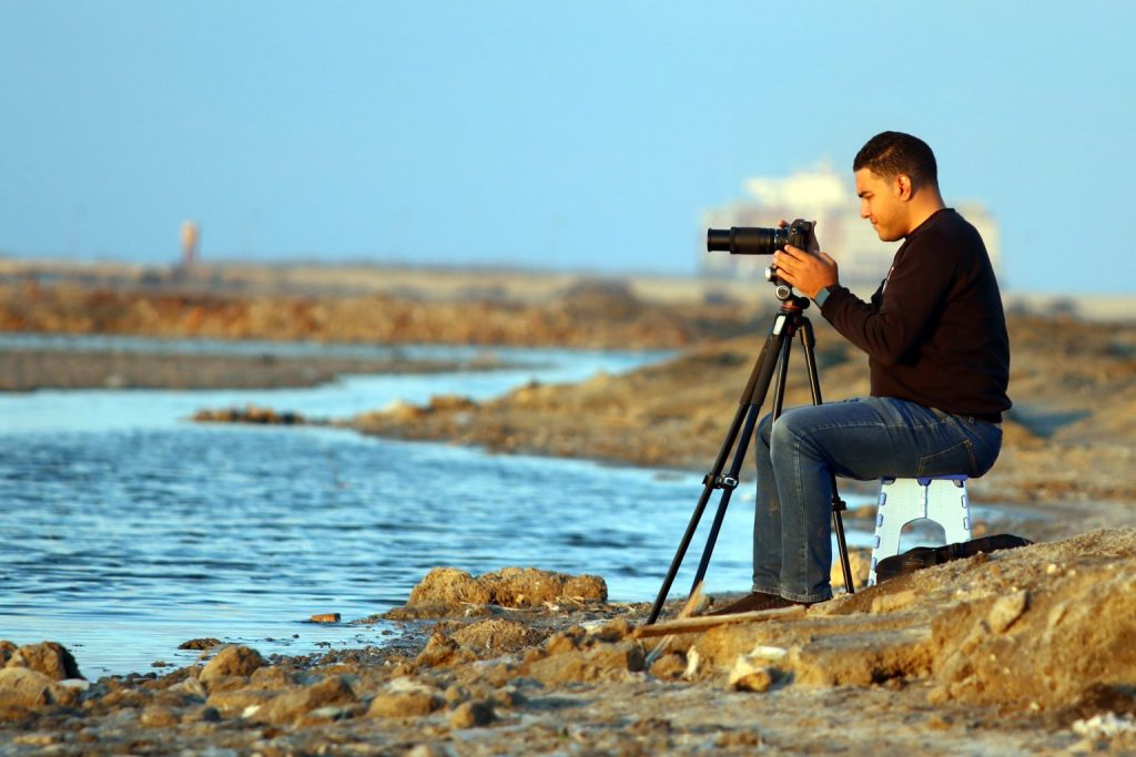 A photographer prepares to take a picture at Lake Port Fuad. Photo by Mohamed Awad