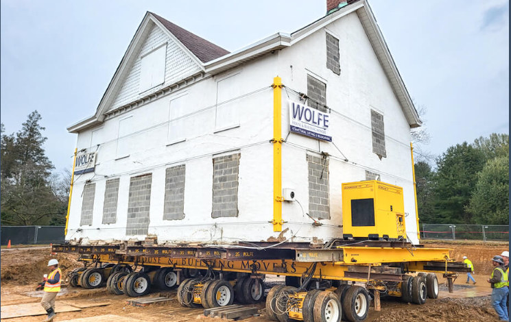 Mechanism for moving a building from its location – Wolf House Building Movers website