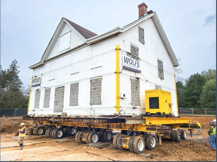 Mechanism for moving a building from its location – Wolf House Building Movers website