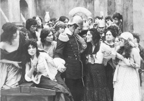 Scene from the first act of the opera Carmen, which first appears in a cigarette factory in Seville