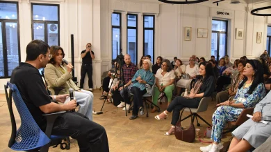 Hend Sabry moderates the first panel discussion alongside poet Salem Masalha. Photo by Heba Moawad