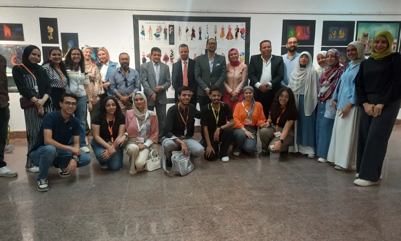 Luxor Fine Arts students alongside the college dean. Photo: Asmaa ElSharkawy