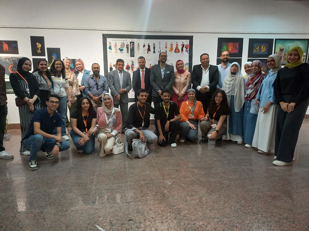 The Luxor Fine Arts Exhibition: Where Student Innovation Meets the Voyages of Sinbad Luxor Fine Arts students alongside the college dean. Photo: Asmaa ElSharkawy
