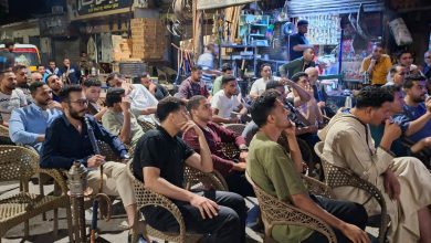 The vibrant energy of Assiut's coffeehouses during match night - Photo: Jasmine Mehana