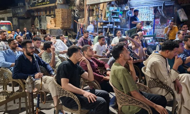 The vibrant energy of Assiut's coffeehouses during match night - Photo: Jasmine Mehana